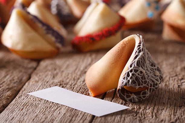 istock Fortune cookie decorated with black and white chocolates macro 537687872