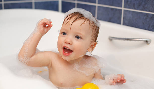 istock Cute baby in the bathroom with foam 537688812