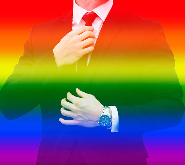 istock businessman with rainbow colors for gay pride 537691854
