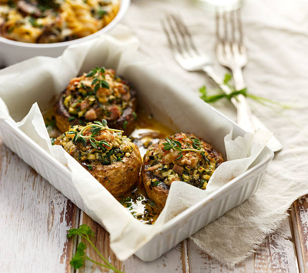 Baked stuffed mushrooms Stuffed mushrooms in a casserole dish stuffed stock pictures, royalty-free photos & images