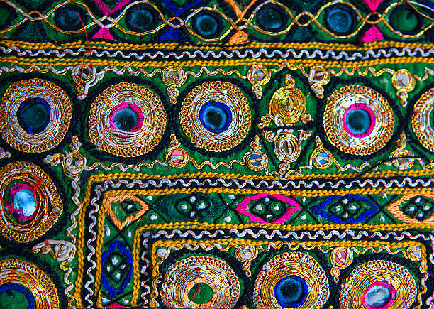 istock Fragment of colorful retro tapestry textile pattern with floral ornament 537693564