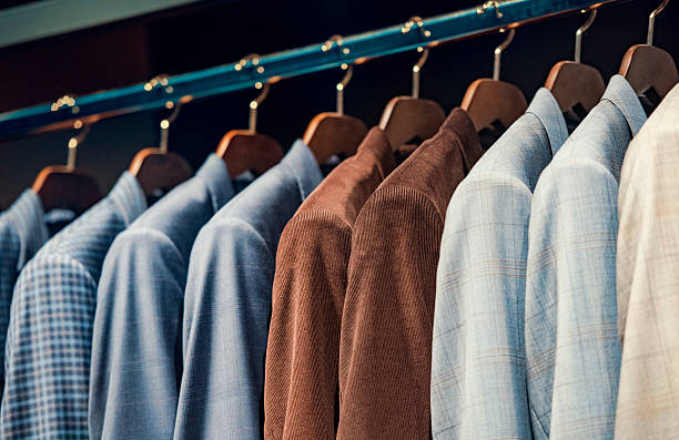 istock Elegant suits in a men clothing store 537694700