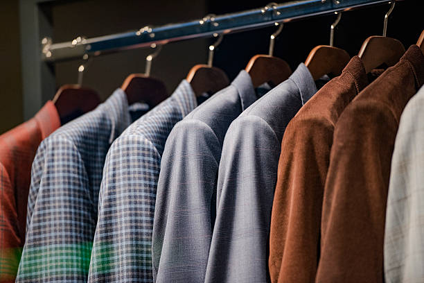istock Elegant suits in a men clothing store 537694852
