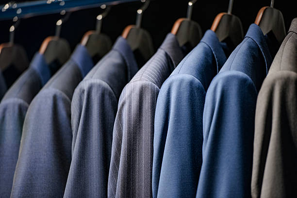 istock Elegant suits in a men clothing store 537694992