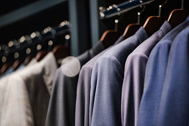 istock Elegant suits in a men clothing store 537695134