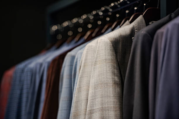 istock Elegant suits in a men clothing store 537695230