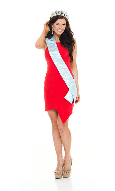 istock Smiling beauty queen looking at camera 537697916