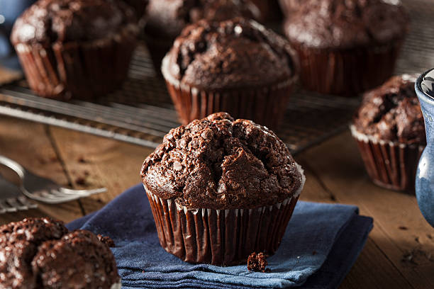 Homemade Dark Chocolate Muffins Homemade Dark Chocolate Muffins to Eat at Breakfast muffin stock pictures, royalty-free photos & images