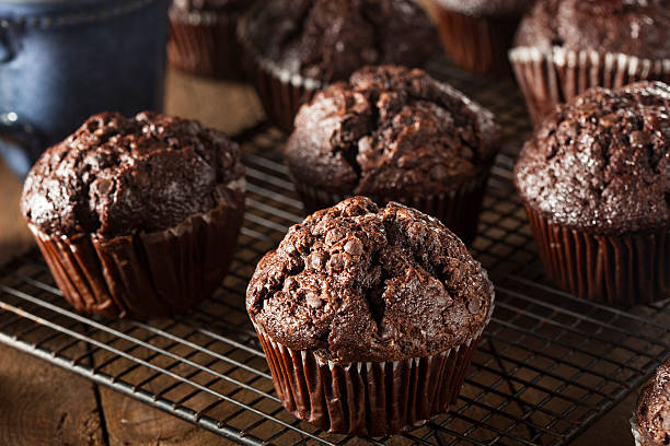 Homemade Dark Chocolate Muffins Homemade Dark Chocolate Muffins to Eat at Breakfast Chocolate Muffin stock pictures, royalty-free photos & images