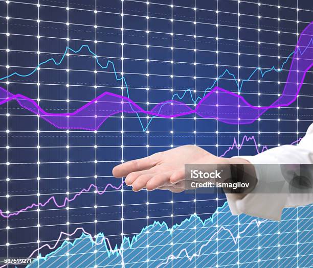 Hand And Stock Graph Stock Photo - Download Image Now - 2015, Analyzing, Arrow Symbol