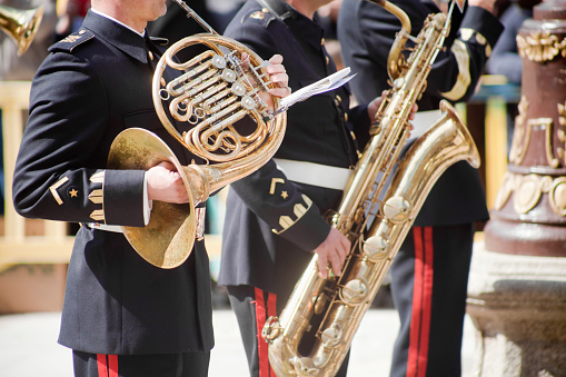 The Kazakh military band plays at the parade. The military band plays trumpets and saxophone. Holiday May 7th.