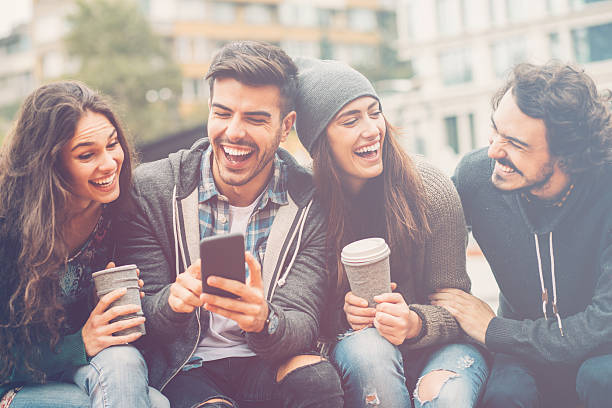 istock Group of friends having coffee and sharing content outdoors 537700268