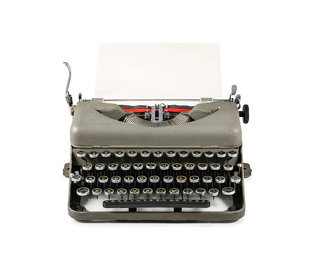 istock Vintage typewriter with paper isolated on white background 537700396