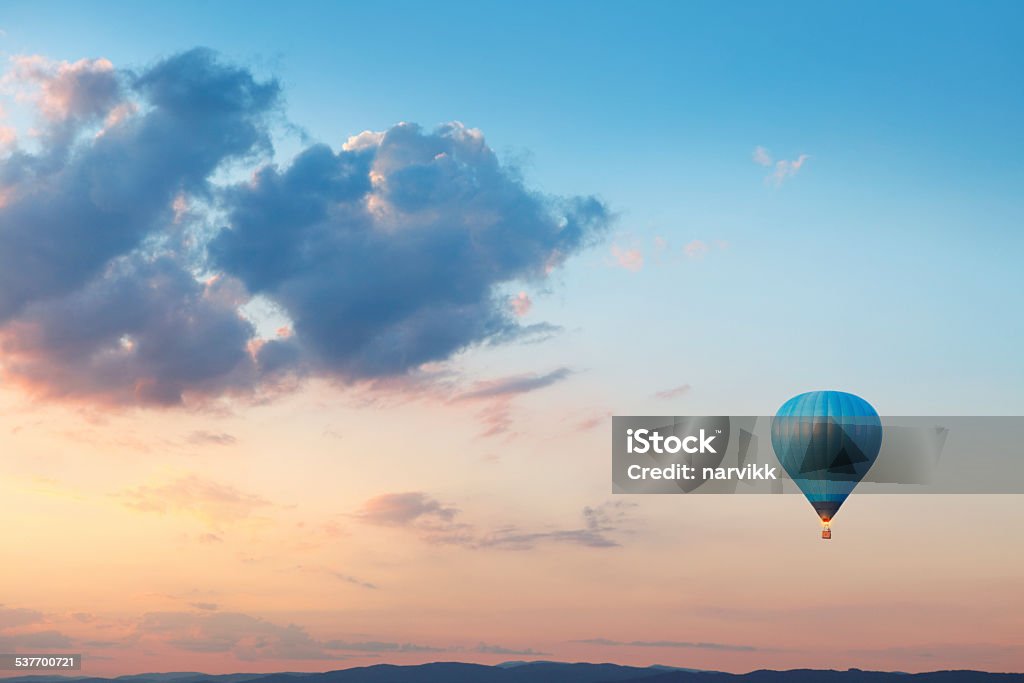 Flying balloon on evening sky Hot Air Balloon Stock Photo