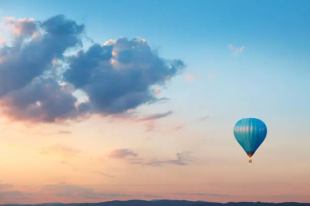 Photo of Flying balloon on evening sky