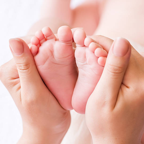 istock Baby feet  close-up 537701493