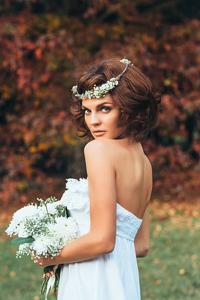 istock Beautiful bride on a background of autumn forest 537702049
