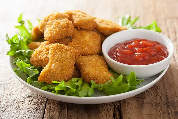 Photo of chicken nuggets with ketchup
