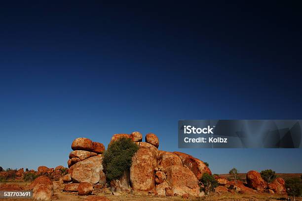 The Devils Marbles Stock Photo - Download Image Now - 2015, Australia, Blue