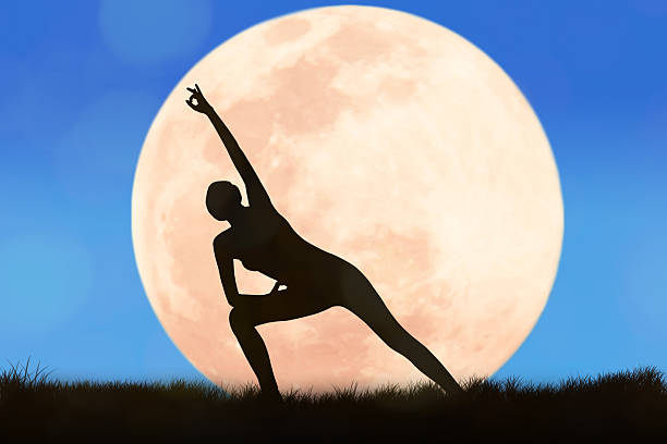 istock Silhouette young woman practicing yoga 537703764