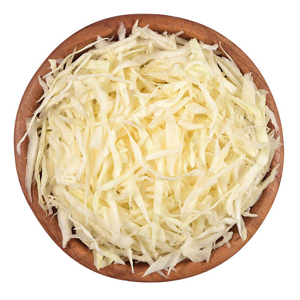 istock Chopped white cabbage in a wooden bowl on a white 537704151