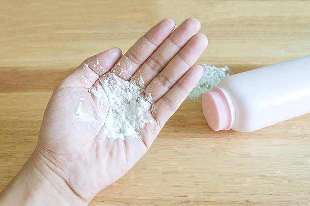 istock Baby talcum powder on hand 537706246