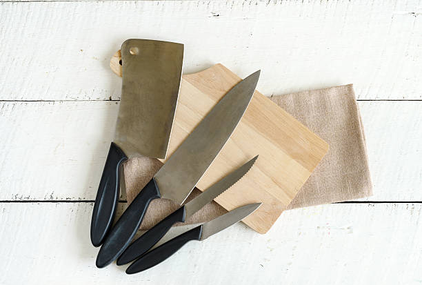 istock Set of kitchen knives on wooden cutting  board 537708164