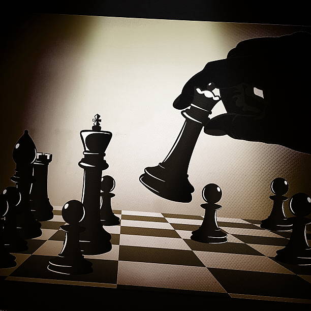 istock Hand moving the king in chess game 537709334