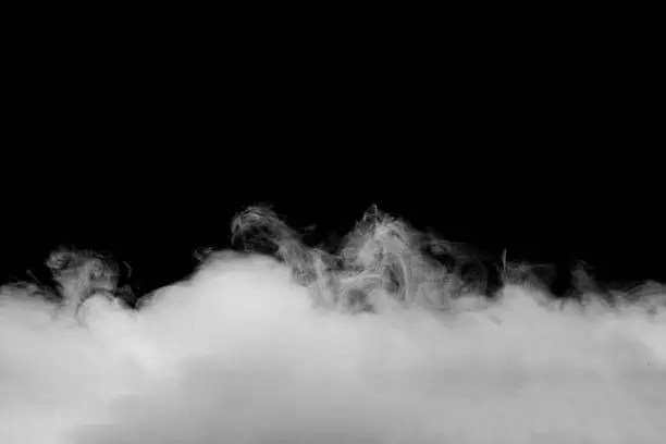 Photo of Abstract fog or smoke move on black color background