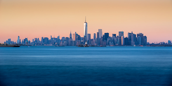 Panoramic Sunset of Lower Manhattan and New York City Harbor with Financial District skyscraper