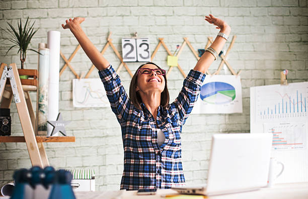 Successful businesswoman. Celebrating Success good news stock pictures, royalty-free photos & images