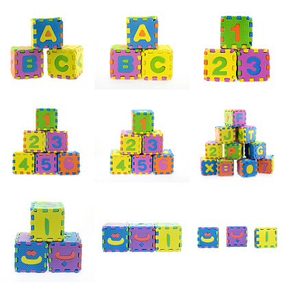 the first three arabic letters and english language letters created from Alphabet puzzle isolated on white background