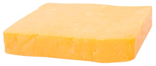 istock cheddar yellow cheese. isolated on white background. 537714463