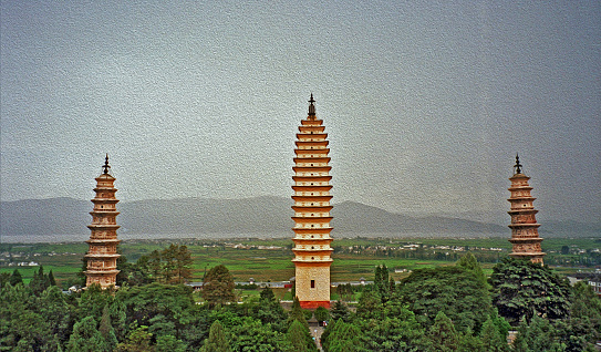 Photo of three famous pagodas in Dali, Yunnan Province, China,  stylized and filtered to resemble an oil painting