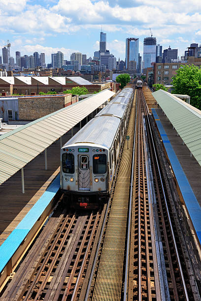 istock Elevated Railway train at Ashland Avenue Station in Chicago 537715156