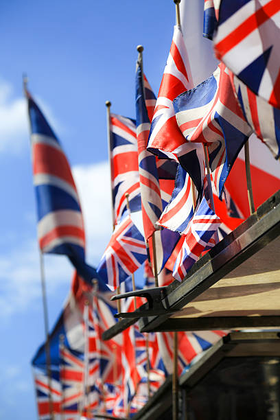 istock Low Angle View Of British Flag Against Sky 537715328