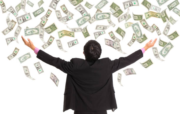 istock Businessman catching money with open arm 537715639