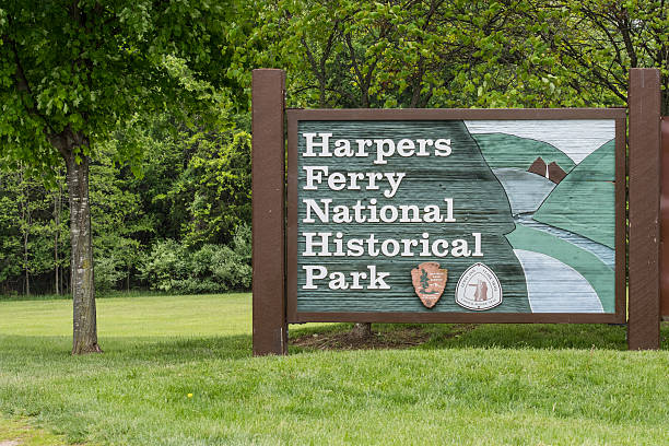 Harpers Ferry National Historic Park Sign Harpers Ferry, United States: May 18th, 2016: Harpers Ferry National Historic Park Sign in West Virginia harpers ferry photos stock pictures, royalty-free photos & images