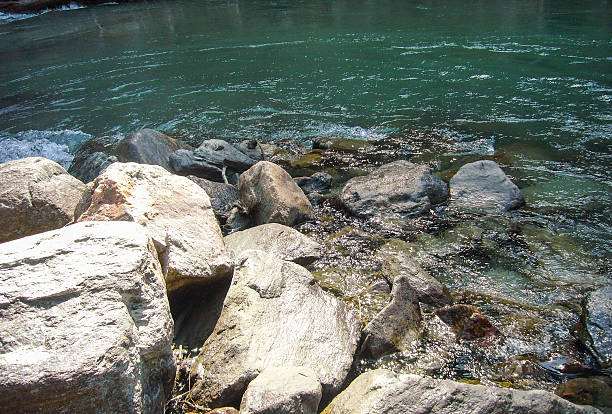 Beach of the large boulders on the edge of the water
