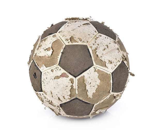 istock Old soccer ball on white background 537718124