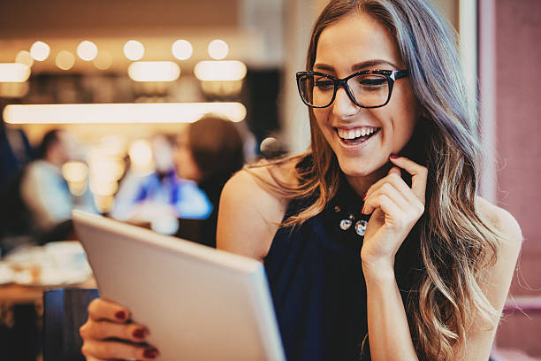 istock Young woman with digital tablet 537718833