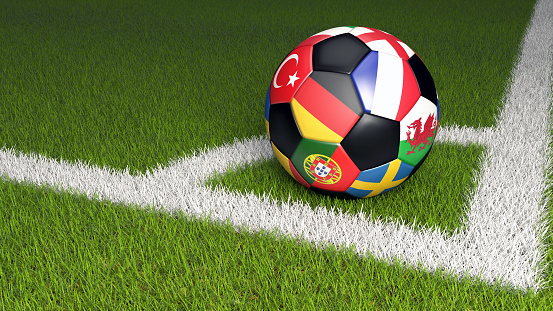 3D illustration of soccer ball on green grass. The ball is placed in the corner of the field. Its segments depict the national flags of various european national teams.