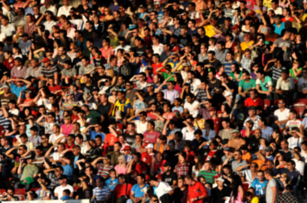 istock Blurred crowd of people 537719329