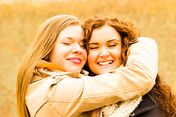 istock Two smiling beautiful girls 537720638