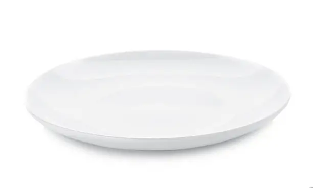 Photo of empty plate isolated on white background