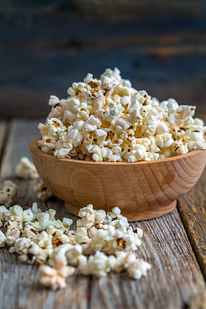istock Tasty popcorn in a wooden cup. 537723028