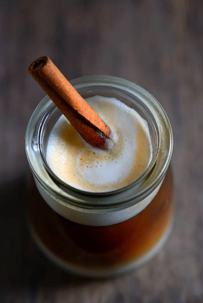 istock Cup of espresso and cinnamon stick 537726728