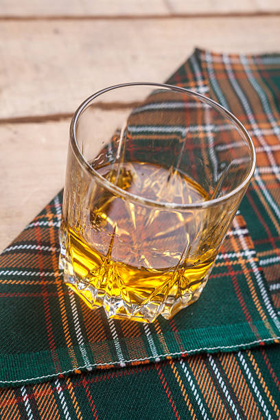 istock Scotch whisky on tartan 537726844