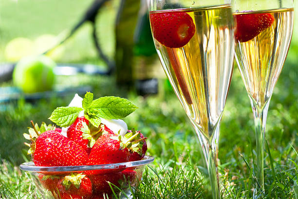 Champagne and strawberry on white 