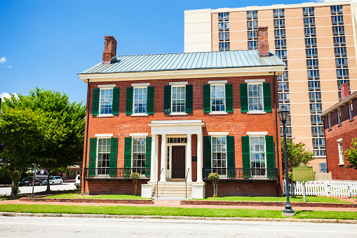 Augusta, Georgia, USA - May 6, 2016:  The boyhood home of Woodrow Wilson in downtown Augusta, Georgia on a sunny day.